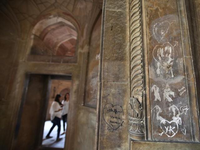 But such symbols of love are rampant across all heritage structures of Delhi. These dilapidated walls of the Safdarjung Tomb speak the same. (Raj K Raj/HT Photos ) But such symbols of love are rampant across all heritage structures of Delhi. These dilapidated walls of the Safdarjung Tomb speak the same. (Raj K Raj/HT Photos )