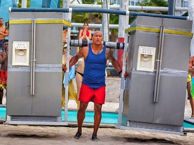 To be clear: Those are refrigerators that Dwayne Johnson is power lifting. Refrigerators. (Instagram) 