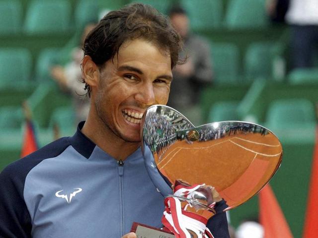 Spain's Rafael Nadal holds his cup after defeating France's Gael Monfils. (AP Photo) Spain's Rafael Nadal holds his cup after defeating France's Gael Monfils. (AP Photo)