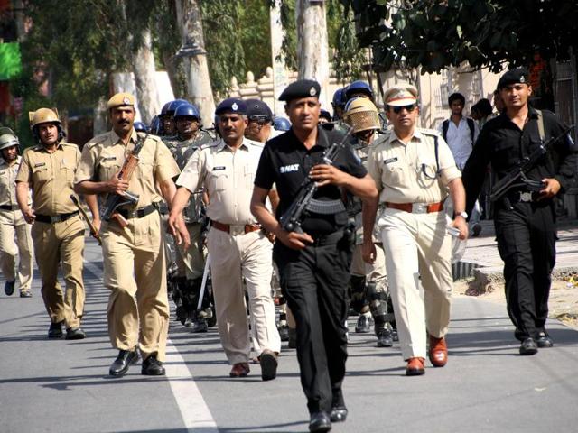 Haryana police personnel took out a flag march on Delhi Road, Rohtak, soon after the state government extended reservation benefits to Jats. (File photo/ Manoj Dhaka) Haryana police personnel took out a flag march on Delhi Road, Rohtak, soon after the state government extended reservation benefits to Jats. (File photo/ Manoj Dhaka)