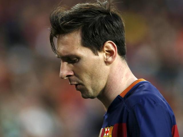 Lionel Messi reacts against Valencia.(Reuters Photo) Lionel Messi reacts against Valencia.(Reuters Photo)