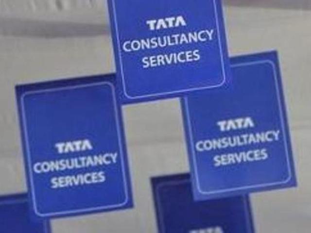 Logos of Tata Consultancy Services (TCS) are displayed at the venue of the annual general meeting of the software services provider in Mumbai.(Reuters File Photo) Logos of Tata Consultancy Services (TCS) are displayed at the venue of the annual general meeting of the software services provider in Mumbai.(Reuters File Photo)