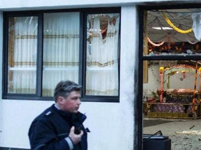 A German policeman stands guard at a gurdwara in the western city of Essen. (Photo: German media) A German policeman stands guard at a gurdwara in the western city of Essen. (Photo: German media)