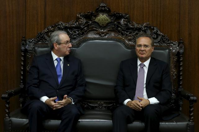 President of the Chamber of Deputies Eduardo Cunha (L) speaks with President of the Brazilian Senate Renan Calheiros during a meeting in Brasilia, Brazil April 18, 2016. (REUTERS) President of the Chamber of Deputies Eduardo Cunha (L) speaks with President of the Brazilian Senate Renan Calheiros during a meeting in Brasilia, Brazil April 18, 2016. (REUTERS)