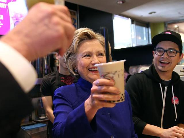 Democratic presidential candidateHillary Clinton tries a bubble tea at Kung Fu Tea in the Queens borough of New York City on Monday, a day before the Democratic and Republican primaries in New York. (AFP) Democratic presidential candidateHillary Clinton tries a bubble tea at Kung Fu Tea in the Queens borough of New York City on Monday, a day before the Democratic and Republican primaries in New York. (AFP)