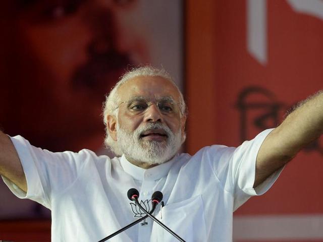 Prime Minister Narendra Modi gestures as he address a public meeting ahead of the legislative assembly election in Kolkata on April 17, 2016. (AFP Photo) Prime Minister Narendra Modi gestures as he address a public meeting ahead of the legislative assembly election in Kolkata on April 17, 2016. (AFP Photo)