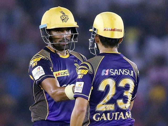 Robin Uthappa of Kolkata Knight Riders is congratulated by Kolkata Knight Riders captain Gautam Gambhir for reaching his fifty. (PTI Photo) 