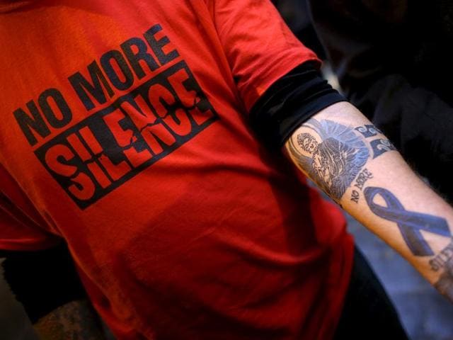 A sex abuse victim wears a t-shirt that says "no more silence" and shows a tattoo on his arm as he stands in Rome during protests against sexual abuse by Catholic church priests.(Reuters file photo) A sex abuse victim wears a t-shirt that says "no more silence" and shows a tattoo on his arm as he stands in Rome during protests against sexual abuse by Catholic church priests.(Reuters file photo)