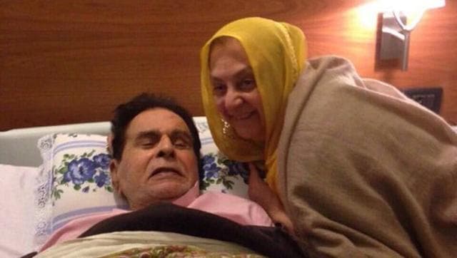 A picture of Saira Banu and Dilip Kumar, in which the couple are seen together as the actor recovers, is trending on social media. The photograph shows the actor resting in bed as Saira Banu looks on. (Twitter)