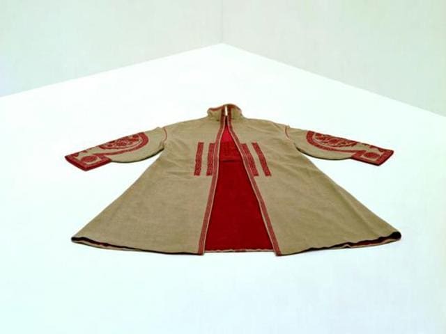 Paul Poiret, day coat worn by Denise Poiret (1886-1982), 1922. It’s a beige wool cloth (kasha) with red wool embroidery. (AFP) Paul Poiret, day coat worn by Denise Poiret (1886-1982), 1922. It’s a beige wool cloth (kasha) with red wool embroidery. (AFP)