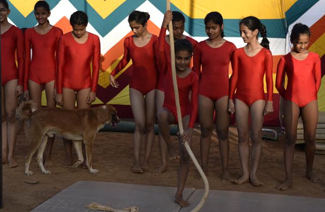 Students of Samarth Vyayam Mandir getting ready to demonstrate their skill  to the students and parents during the opening ceremony of a summer camp at Dadar in Mumbai, India, on Sunday.  (satish bate/Hindustan Times) 