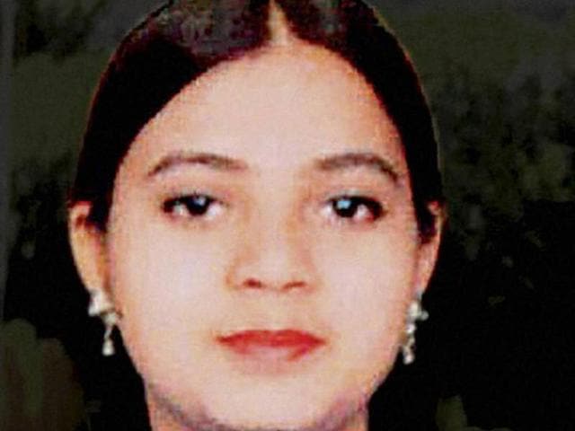 A file photo of demonstrators holding a candlelight vigil for Ishrat Jahan. A file photo of demonstrators holding a candlelight vigil for Ishrat Jahan.
