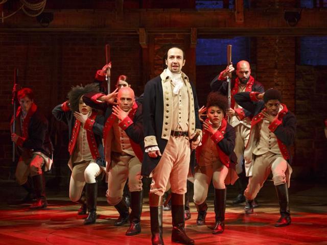 This image released by The Public Theater shows Lin-Manuel Miranda, foreground, with the cast during a performance of Hamilton, in New York. Hamilton, the hip-hop stage biography of Alexander Hamilton won the 2016 Pulitzer Prize for drama. (Joan Marcus/The Public Theater via AP)