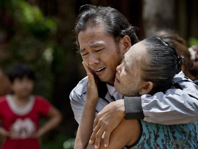In this May 16, 2015, file photo, former slave fisherman Myint Naing and his mother, Khin Than, cry as they are reunited after 22 years at their village in Mon State, Myanmar. The Associated Press has won the Pulitzer Prize on Monday, April 18, 2016 for public service for articles documenting the use of slave labour in the commercial seafood industry in Indonesia and Thailand. (Gemunu Amarasinghe/AP)