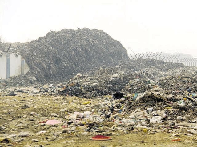 The Central Ground Water Authority has confirmed that leachate from defunct Bandhwari municipal waste treatment plant is flowing into natural water recharge zones, thus, polluting the ground water in the Aravallis.(Manoj Kumar/HT Photo)