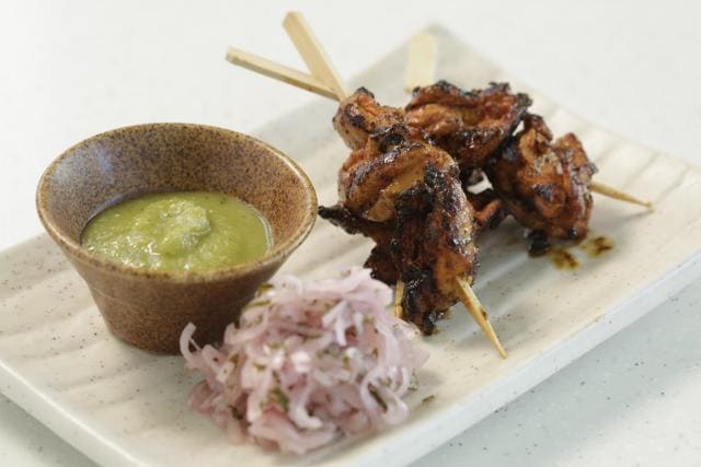 The Brazilian churrasco (grill) of gojuchang- and honey- marinated chicken thighs is salty, sweet, spicy and plump. The Brazilian churrasco (grill) of gojuchang- and honey- marinated chicken thighs is salty, sweet, spicy and plump.