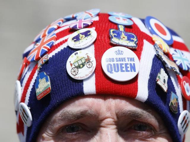 John Loughrey, a royal fan wears a hat covered in badges in Windsor, England, Wednesday, April 20, 2016. (AP Photo) John Loughrey, a royal fan wears a hat covered in badges in Windsor, England, Wednesday, April 20, 2016. (AP Photo)