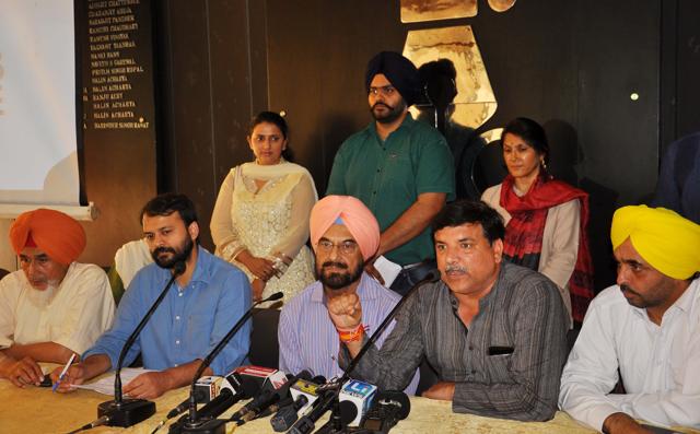 From left: AAP leaders Sucha Singh Chhotepur, Ashish Khetan, Kanwar Sandhu, Sanjay Singh and Bhagwant Maan at a press conference in Chandigarh on Wednesday. (Karun Sharma/HT ) From left: AAP leaders Sucha Singh Chhotepur, Ashish Khetan, Kanwar Sandhu, Sanjay Singh and Bhagwant Maan at a press conference in Chandigarh on Wednesday. (Karun Sharma/HT )