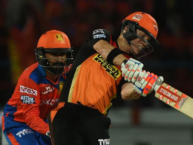 Sunrisers Hyderabad captain David Warner (R) watched by Gujarat Lions wicketkeeper Dinesh Karthik plays a shot during the 2016 Indian Premier League(IPL). (AFP Photo) Sunrisers Hyderabad captain David Warner (R) watched by Gujarat Lions wicketkeeper Dinesh Karthik plays a shot during the 2016 Indian Premier League(IPL). (AFP Photo)