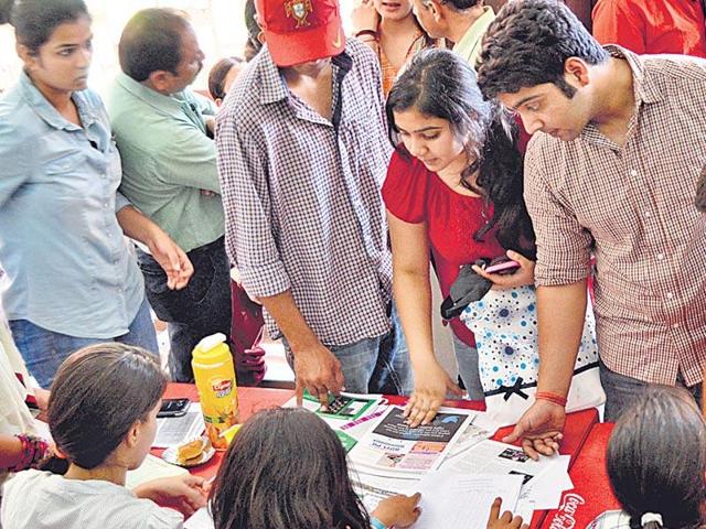 Students at the Delhi University during admissions. The university has 8,000 seats across 66 postgraduate courses. (Hindustan Times File) Students at the Delhi University during admissions. The university has 8,000 seats across 66 postgraduate courses. (Hindustan Times File)