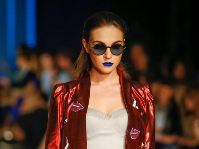 A model presents a creation by design house BANOOME. Will you be adventurous enough to try a blue lipstick someday? (REUTERS) A model presents a creation by design house BANOOME. Will you be adventurous enough to try a blue lipstick someday? (REUTERS)