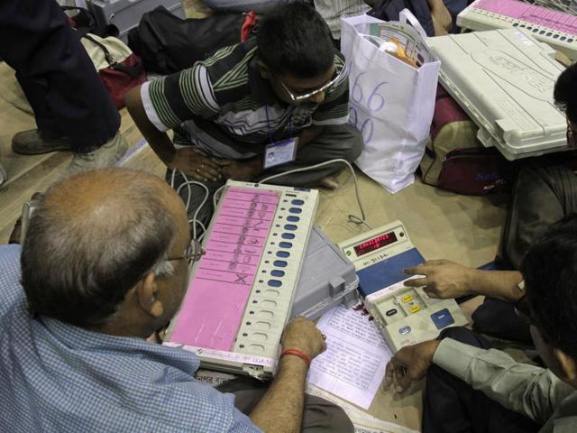 Election officials inspect electronic voting machines and other polling material ahead of the third phase of voting to the West Bengal state Assembly elections in Kolkata, Wednesday, April 20, 2016. (AP) Election officials inspect electronic voting machines and other polling material ahead of the third phase of voting to the West Bengal state Assembly elections in Kolkata, Wednesday, April 20, 2016. (AP)