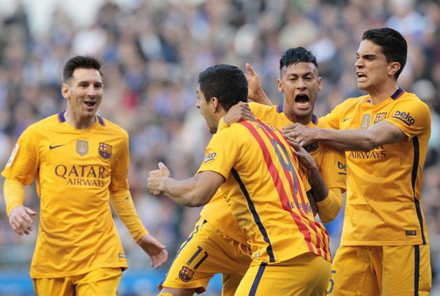 Barcelona's Luis Suarez (second from left) is congratulated by teammates after scoring the first goal during a Spanish La Liga football match between Deportivo and Barcelona at the Riazor stadium in A Coruna. (AP Photo) Barcelona's Luis Suarez (second from left) is congratulated by teammates after scoring the first goal during a Spanish La Liga football match between Deportivo and Barcelona at the Riazor stadium in A Coruna. (AP Photo)