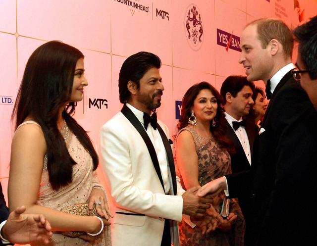 Prince William, Duke of Cambridge meeting actors Aishwarya Rai Bachchan, Madhuri Dixit and Shahrukh Khan during the Bollywood theme dinner in Mumbai. (PTI) Prince William, Duke of Cambridge meeting actors Aishwarya Rai Bachchan, Madhuri Dixit and Shahrukh Khan during the Bollywood theme dinner in Mumbai. (PTI)