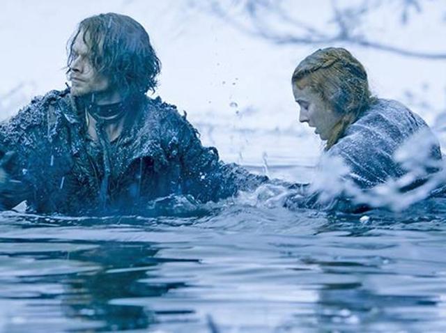 Theon and Sansa braving an icy river to escape the clutches of Ramsay’s men. (HBO)