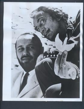 Salvador Dali along with Jot Singh of Air India. Dali shows off his ashtray Salvador Dali along with Jot Singh of Air India. Dali shows off his ashtray