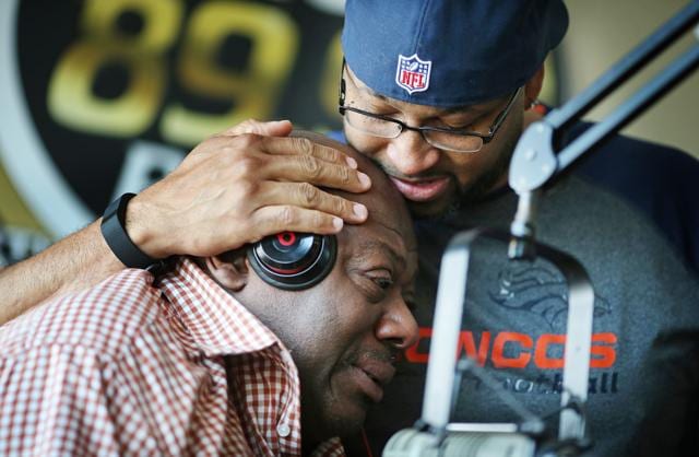 KMOJ host of afternoon drive time show Walter Q Bear Banks left and Shed G embraced each other as they talked about the death of Prince Thursday, April 21, 2016 Minneapolis, Minn. Banks a long time resident of Minneapolis grew up with Prince. (AP) KMOJ host of afternoon drive time show Walter Q Bear Banks left and Shed G embraced each other as they talked about the death of Prince Thursday, April 21, 2016 Minneapolis, Minn. Banks a long time resident of Minneapolis grew up with Prince. (AP)