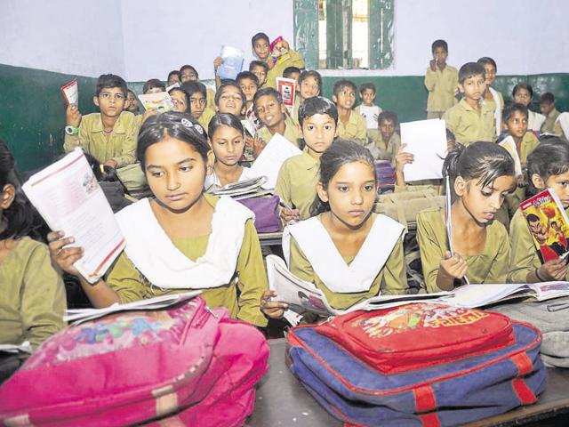 For nearly a month, children have been studying without fan, light and water supply. (Sakib Ali/HT Photo) For nearly a month, children have been studying without fan, light and water supply. (Sakib Ali/HT Photo)