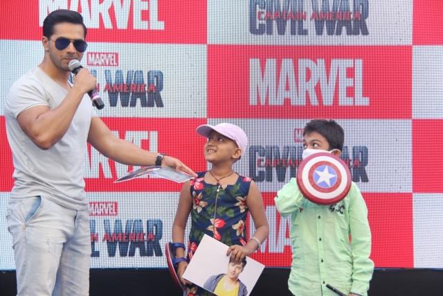 Varun Dhawan with kids at the unveiling of the Captain America statue. (IANS)