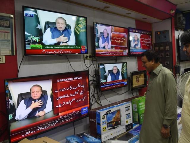 Pakistani men watch a televised addresses to the nation by Prime Minister Nawaz Sharif in Karachi on April 22, 2016. (AFP) Pakistani men watch a televised addresses to the nation by Prime Minister Nawaz Sharif in Karachi on April 22, 2016. (AFP)