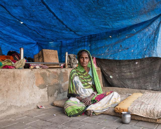 55-year-old Radha Laxman Rajput was born on the streets of South Mumbai. Her paternal grandfather had walked from a village near Ahmedabad to Mumbai to find work. She depends on her family for money. (BIND Collective) 55-year-old Radha Laxman Rajput was born on the streets of South Mumbai. Her paternal grandfather had walked from a village near Ahmedabad to Mumbai to find work. She depends on her family for money. (BIND Collective)