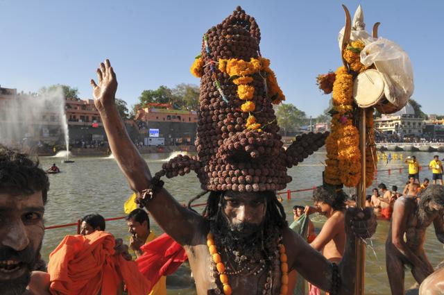 Naga sadhus and others take a dip in the Kshipra river in Ujjain on the first Shahi Snan on occasion of Simhastha Kumbh Mela in Ujjain. (Shankar Mourya/HT Photo) Naga sadhus and others take a dip in the Kshipra river in Ujjain on the first Shahi Snan on occasion of Simhastha Kumbh Mela in Ujjain. (Shankar Mourya/HT Photo)