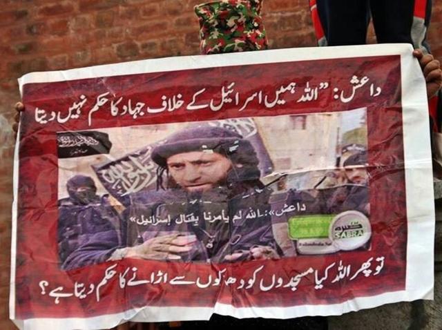 Written in Urdu, the poster shows an IS commander as saying, “God does not order us to declare jihad against Israel”, in response to which a second line questions: “Then does God order you to blast mosques?” (Baist Zargar/JK Headlines) Written in Urdu, the poster shows an IS commander as saying, “God does not order us to declare jihad against Israel”, in response to which a second line questions: “Then does God order you to blast mosques?” (Baist Zargar/JK Headlines)