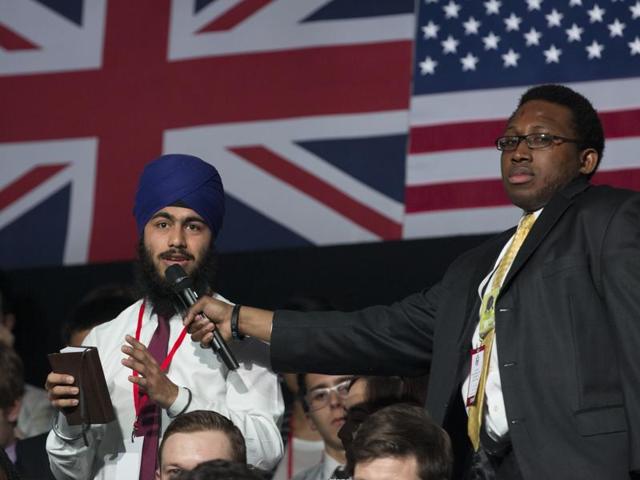 A Sikh man asks a question of US President Barack Obama during a town hall meeting with an audience at Lindley Hall, the Royal Horticultural Society, in London. (AP) A Sikh man asks a question of US President Barack Obama during a town hall meeting with an audience at Lindley Hall, the Royal Horticultural Society, in London. (AP)