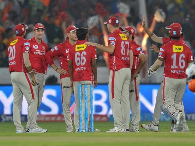 Kings XI Punjab players celebrate the wicket of David Warner. (AFP)