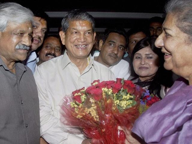 Uttarakhand Congress incharge Ambika Soni (R) presents a bouquet to Chief Minister Harish Rawat during a meeting in Dehradun on Friday, April 22, 2016. (PTI) Uttarakhand Congress incharge Ambika Soni (R) presents a bouquet to Chief Minister Harish Rawat during a meeting in Dehradun on Friday, April 22, 2016. (PTI)