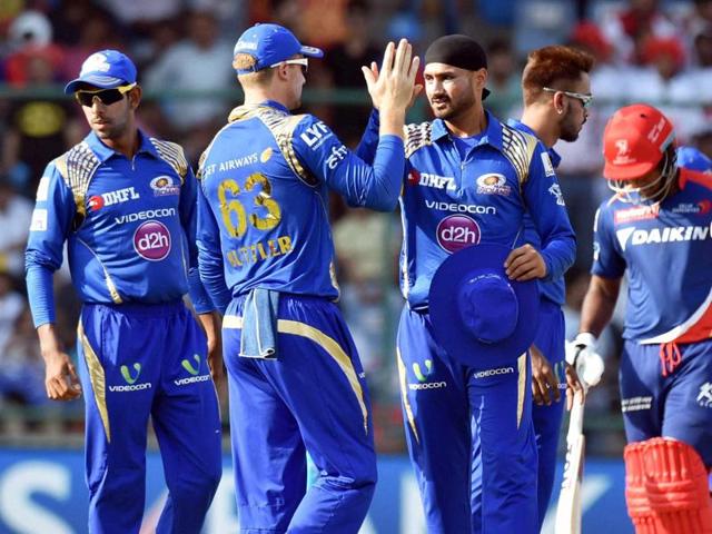 Mumbai Indian player Harbhajan Singh celebrates with team mates. (PTI Photo)