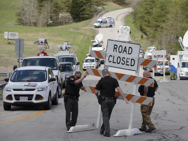 Authorities set up road blocks at the intersection of Union Hill Road and Route 32 at the perimeter of a crime scene, Friday, April 22, 2016, in Pike County, Ohio. (AP Photo) Authorities set up road blocks at the intersection of Union Hill Road and Route 32 at the perimeter of a crime scene, Friday, April 22, 2016, in Pike County, Ohio. (AP Photo)