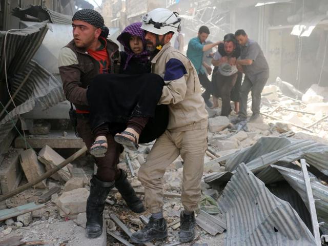 Syrian civil defence volunteers evacuate wounded people following a reported airstrike on April 22, 2016 in the rebel-held neighbourhood of Hayy Aqyul in Syria's second city Aleppo. (AFP) Syrian civil defence volunteers evacuate wounded people following a reported airstrike on April 22, 2016 in the rebel-held neighbourhood of Hayy Aqyul in Syria's second city Aleppo. (AFP)