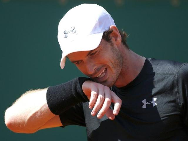 Andy Murray of Britain wipes his face during his match against Rafael Nadal of Spain. (Reuters Photo) Andy Murray of Britain wipes his face during his match against Rafael Nadal of Spain. (Reuters Photo)