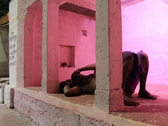 A man retires in a small temple after day’s work in Ujjain. (Ritesh Mishra/HT photo) A man retires in a small temple after day’s work in Ujjain. (Ritesh Mishra/HT photo)