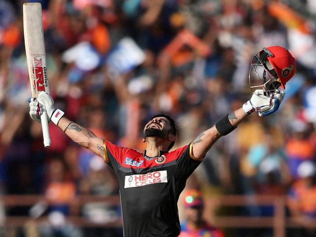 Royal Challengers Bangalore captain Virat Kohli celebrates his century during an IPL T20 match. (PTI Photo) Royal Challengers Bangalore captain Virat Kohli celebrates his century during an IPL T20 match. (PTI Photo)