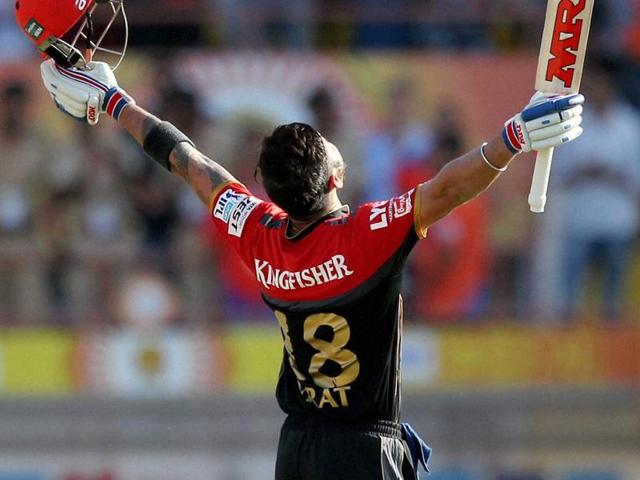 Royal Challengers Bangalore captain Virat Kohli celebrates his century. (PTI Photo) Royal Challengers Bangalore captain Virat Kohli celebrates his century. (PTI Photo)