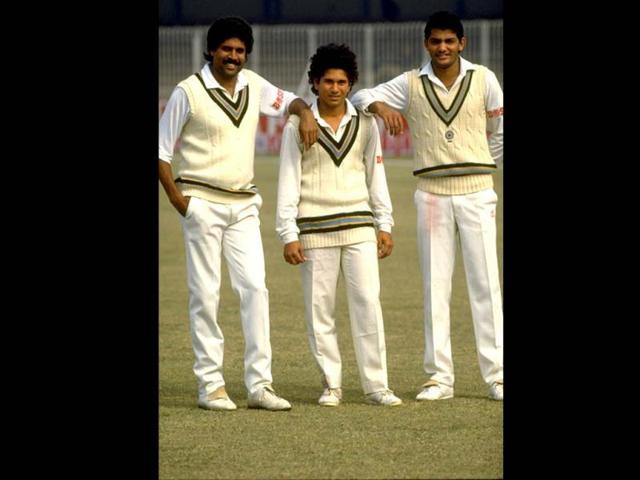 A young Sachin poses with stalwarts Kapil Dev and Mohammed Azharuddin in Pakistan. Allsport UK /Allsport. Getty Images.