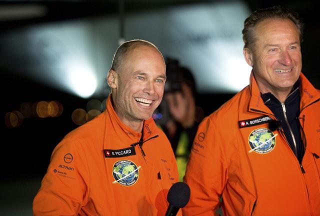 Solar Impulse 2 pilots Bertrand Piccard (left) and Andre Borschberg (right) celebrate after Piccard landed their solar-powered plane at Moffett Field. (AP Photo) Solar Impulse 2 pilots Bertrand Piccard (left) and Andre Borschberg (right) celebrate after Piccard landed their solar-powered plane at Moffett Field. (AP Photo)
