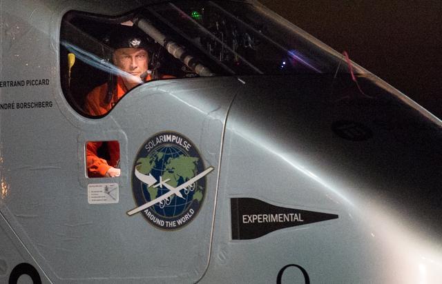 Solar Impulse 2 pilot Bertrand Piccard looks out his cockpit window shortly after landing at Moffett Field in Mountain View, California. (AP Photo) Solar Impulse 2 pilot Bertrand Piccard looks out his cockpit window shortly after landing at Moffett Field in Mountain View, California. (AP Photo)